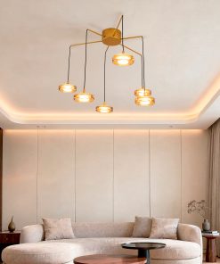 Pavot Gold dizajnerski luster u modernom dnevnom boravku