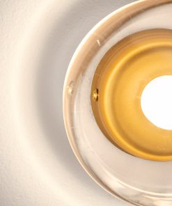 Detalj prozirnog staklenog diska zidne lampe Fondo Gold